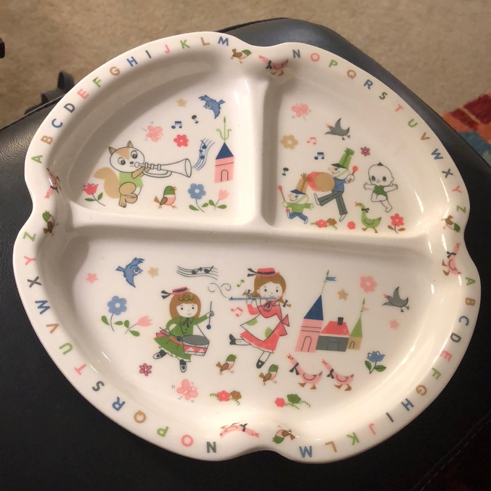 Vintage melamine plate. Alphabet animals dancing characters musical instrument.